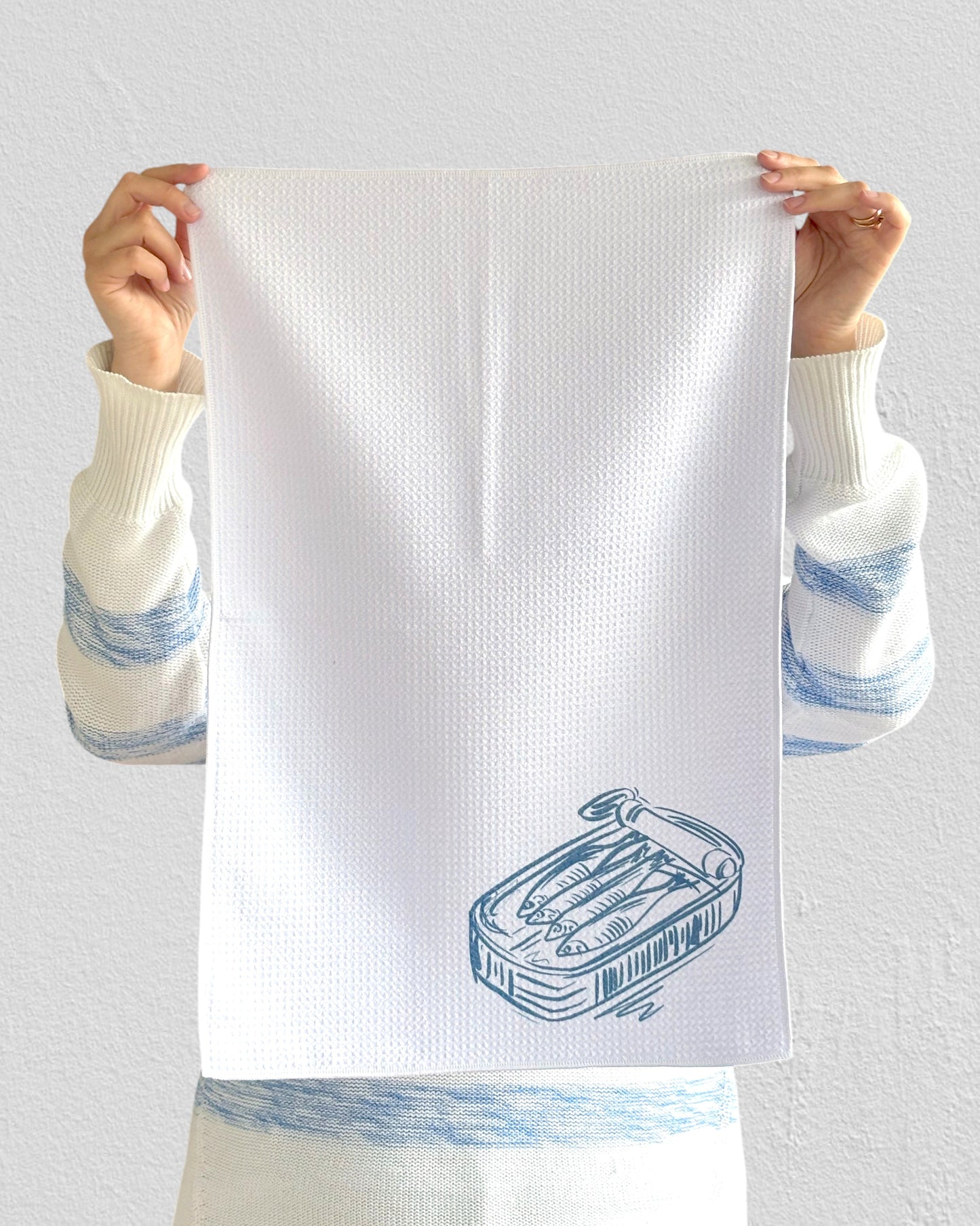 Sardine tin, waffle tea towel