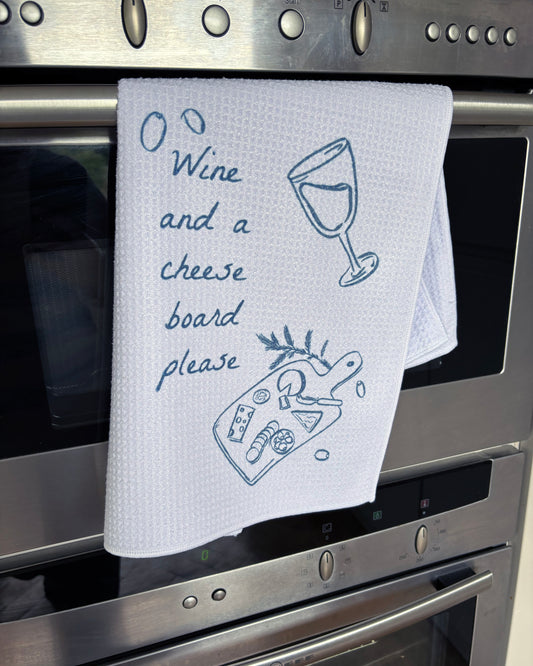 Wine and a cheese board, waffle tea towel