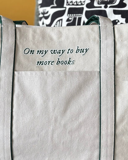 On my way to buy more books - Heatherfall Tote Bag